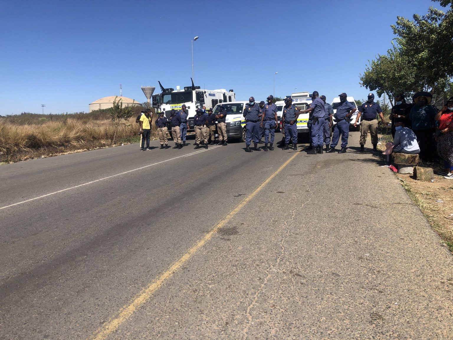 Pics: Police On Guard At Rabie Ridge Protest - KAYA 959